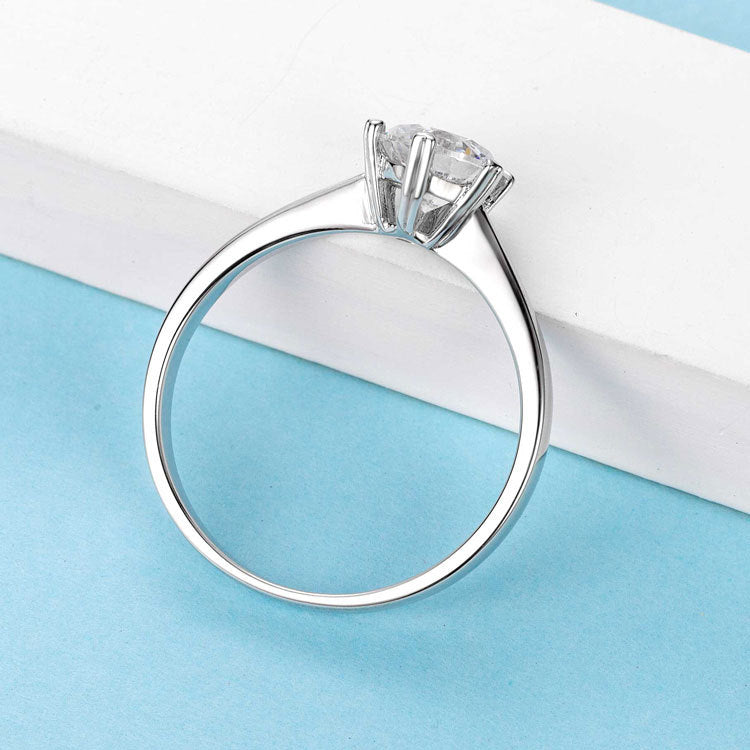 Snowdrift™ Solitaire Moissanite Ring – Sterling Silver Claw Setting