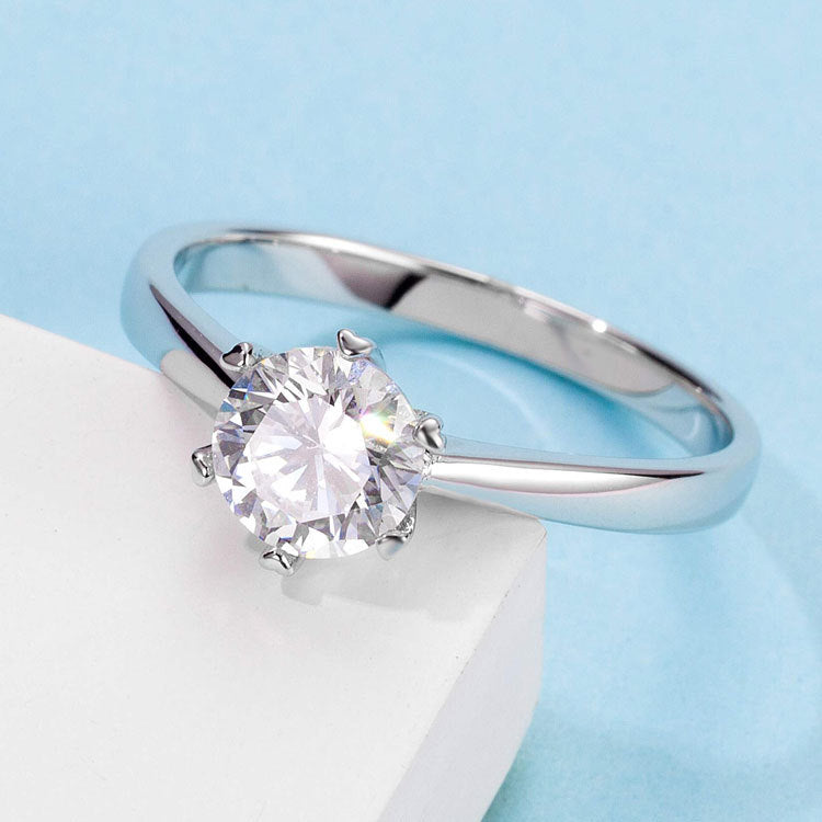 Snowdrift™ Solitaire Moissanite Ring – Sterling Silver Claw Setting